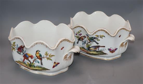 A pair of Helena Wolfsohn jardinieres, painted with birds of paradise and insects length 28cm